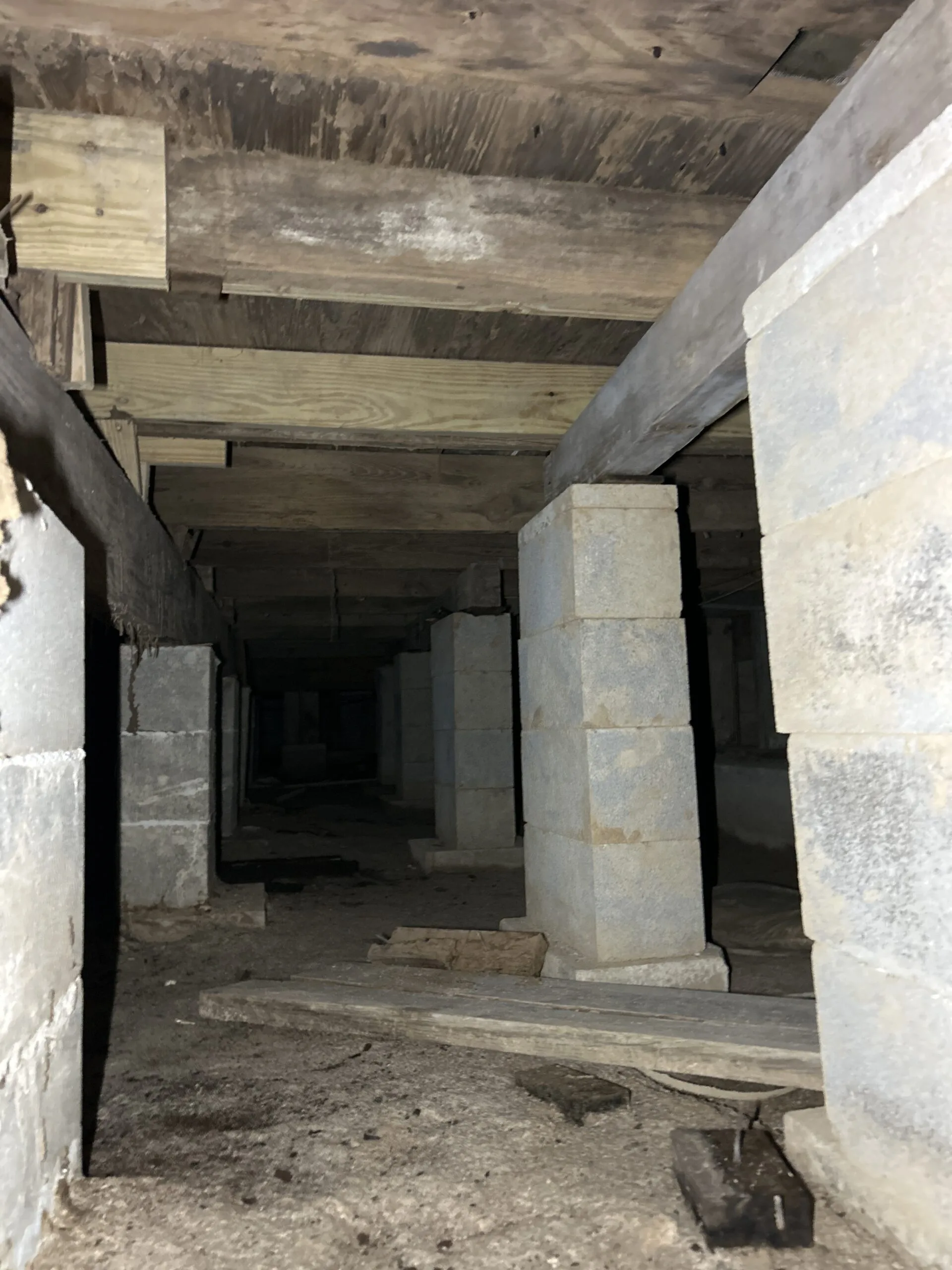 Concrete block piers beneath a building