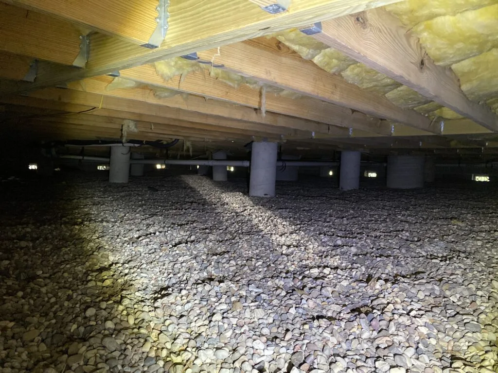 Crawlspace with evenly spaced foundation piers