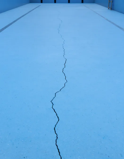 Long crack across a swimming pool floor